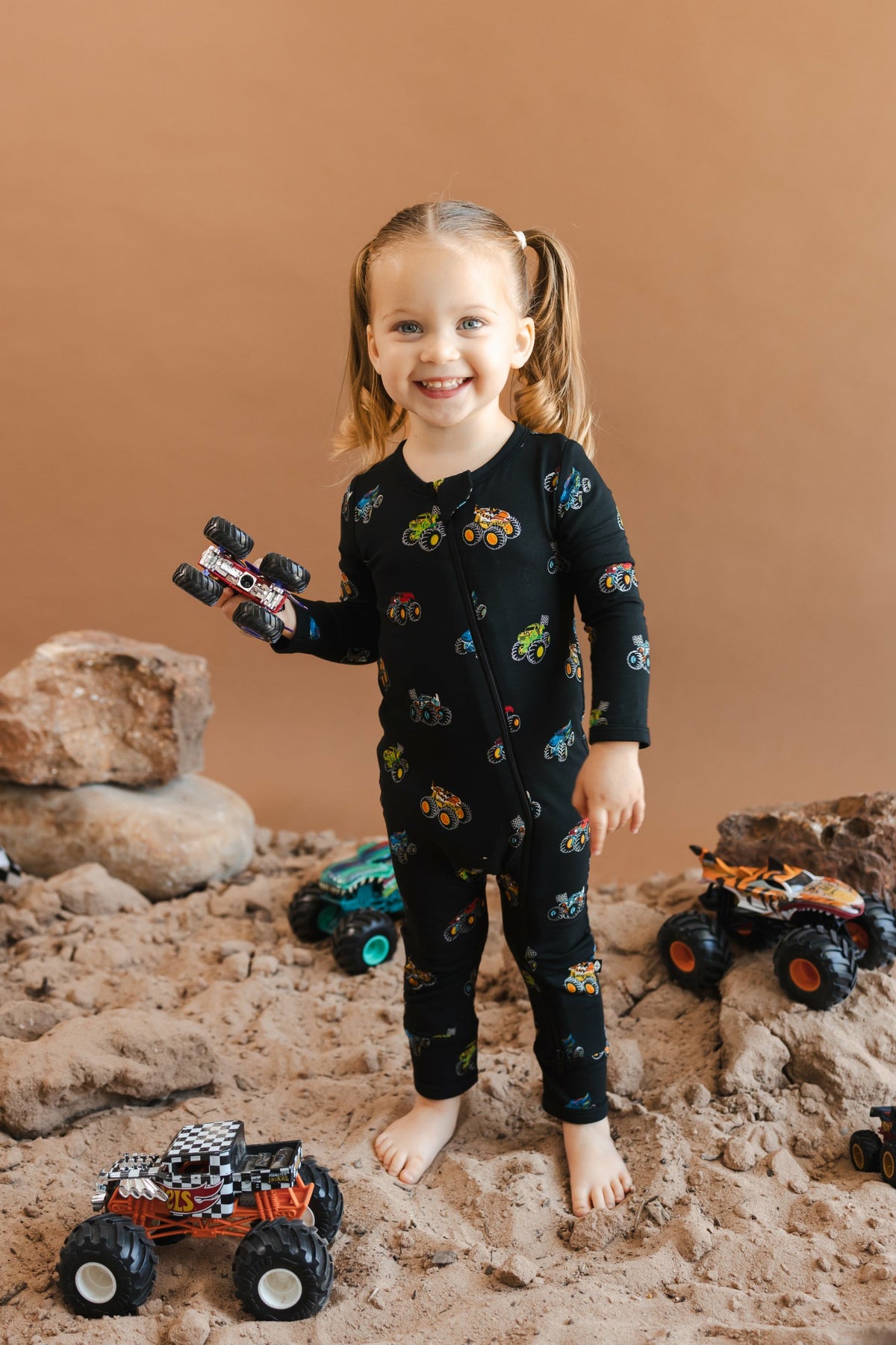 Kyte Baby Zippered Romper in Monster Truck