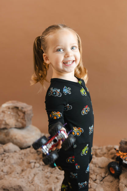 Kyte Baby Zippered Romper in Monster Truck