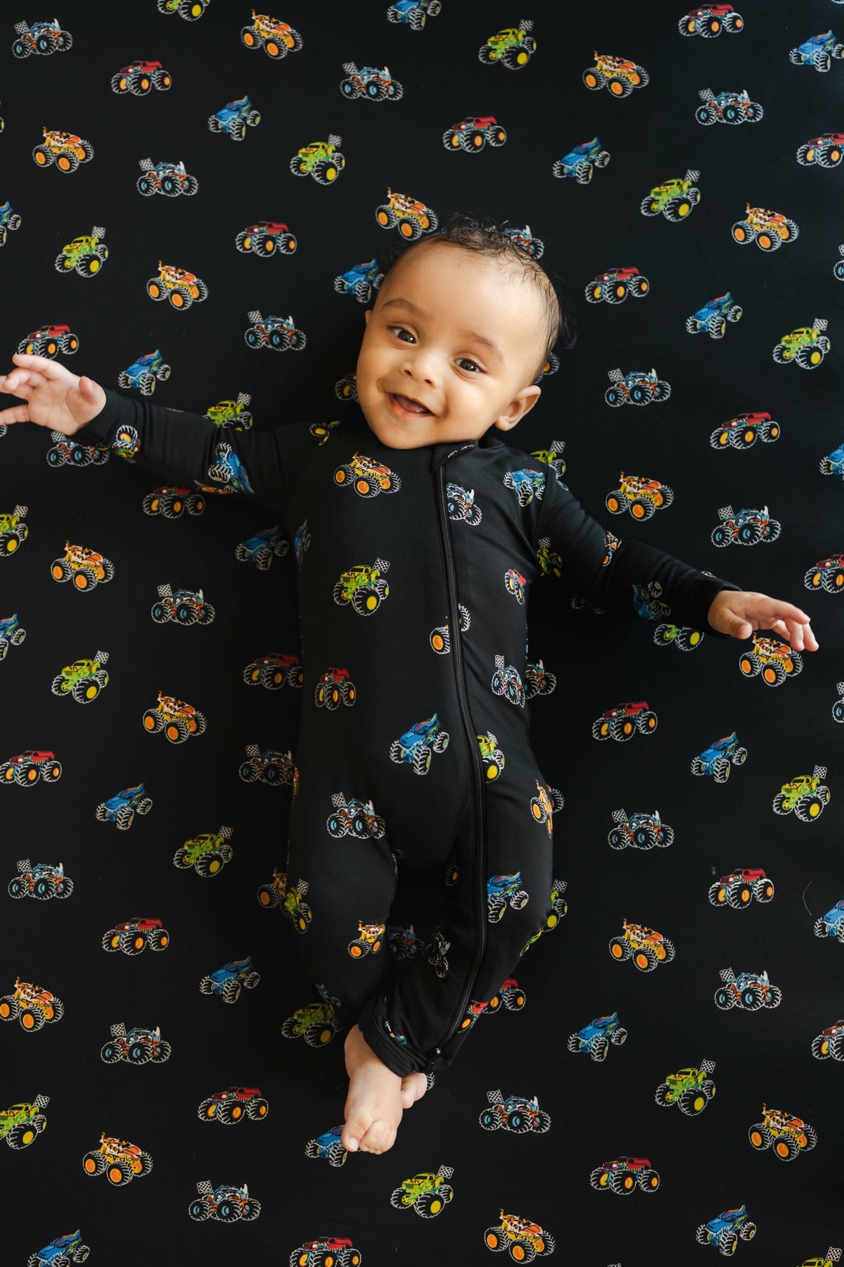 Kyte Baby Zippered Romper in Monster Truck