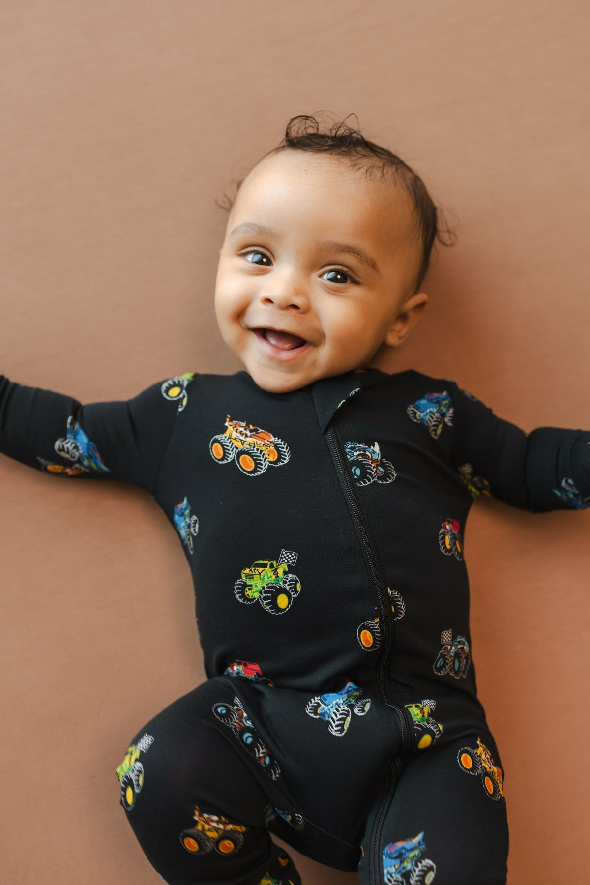 Kyte Baby Zippered Romper in Monster Truck