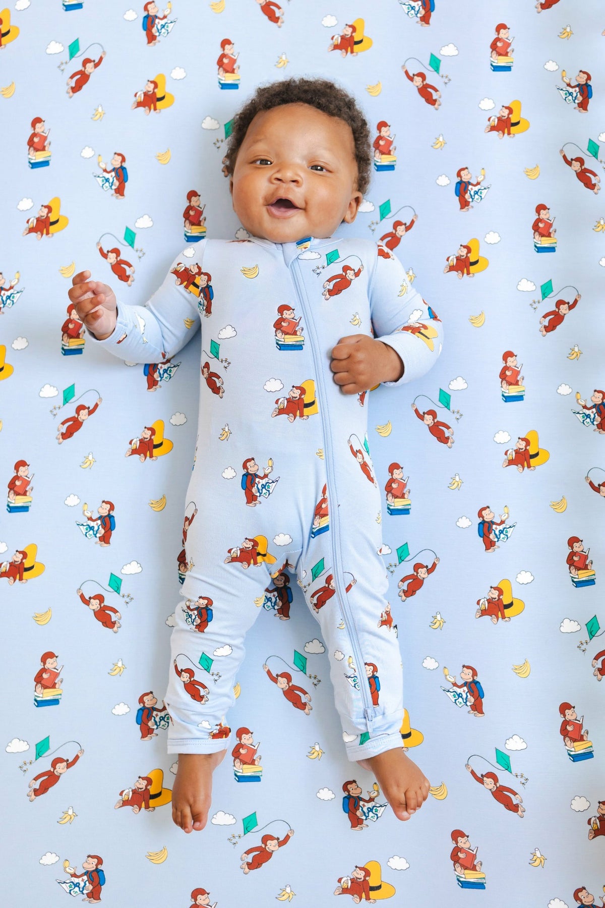 Kyte Baby Zippered Romper in Curious George