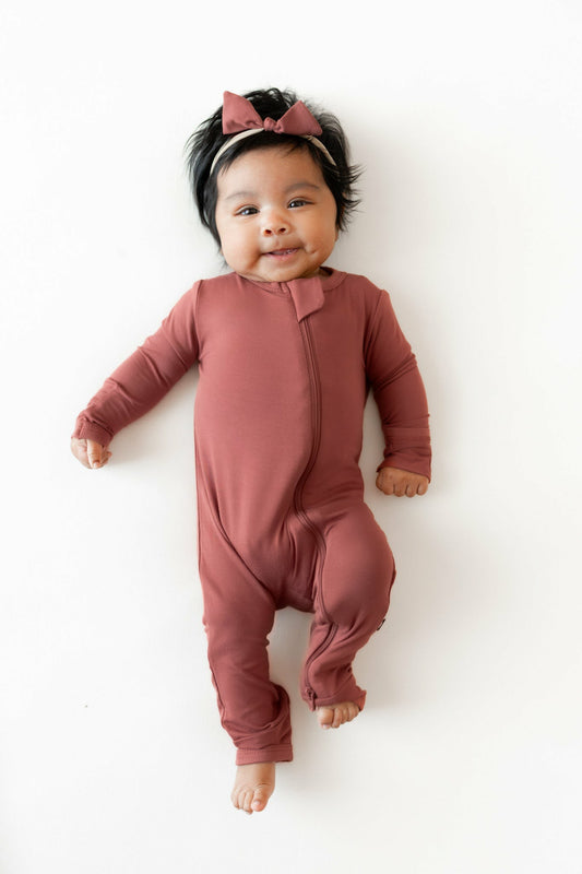 Kyte Baby Zippered Romper in Ember