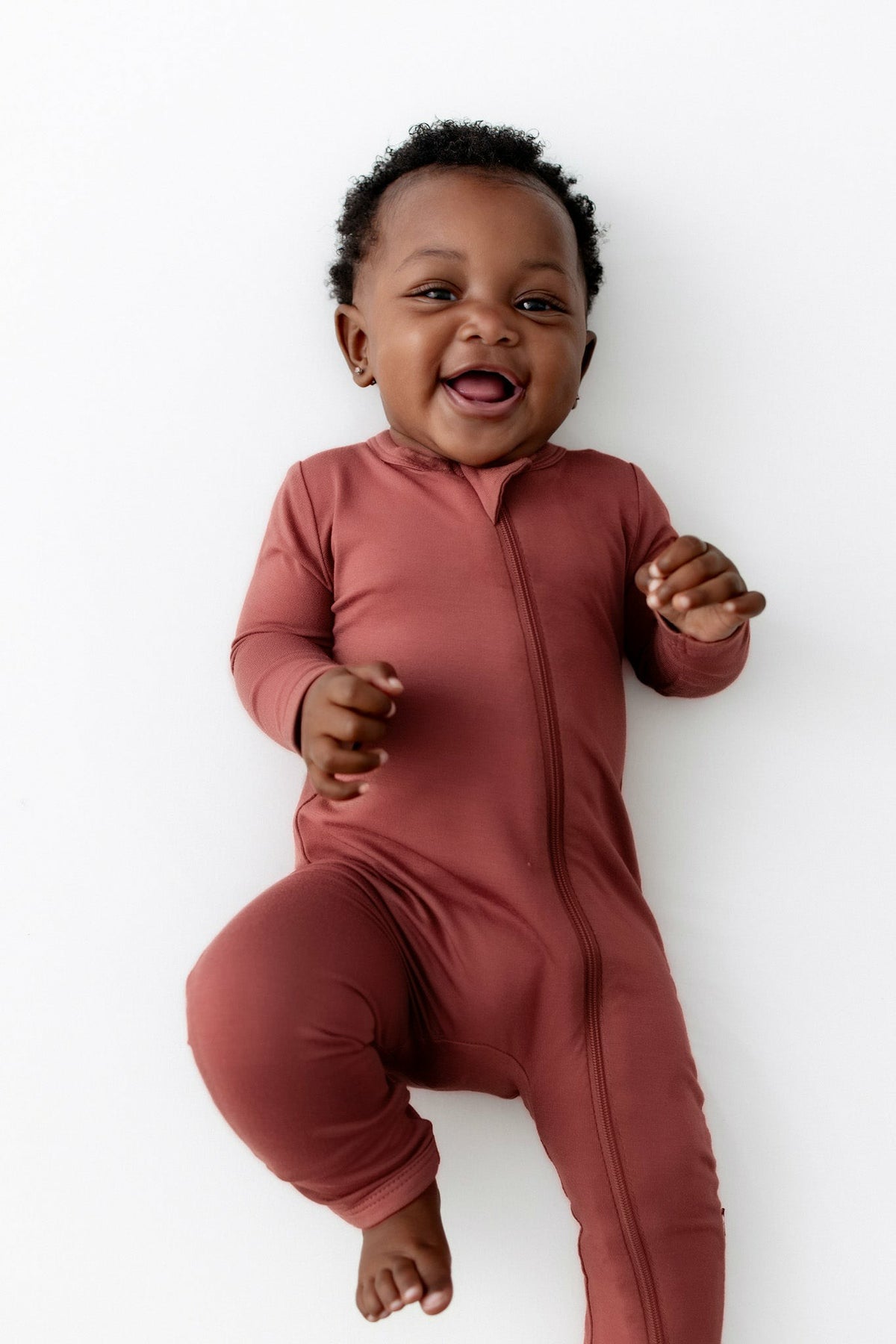Kyte Baby Zippered Romper in Ember