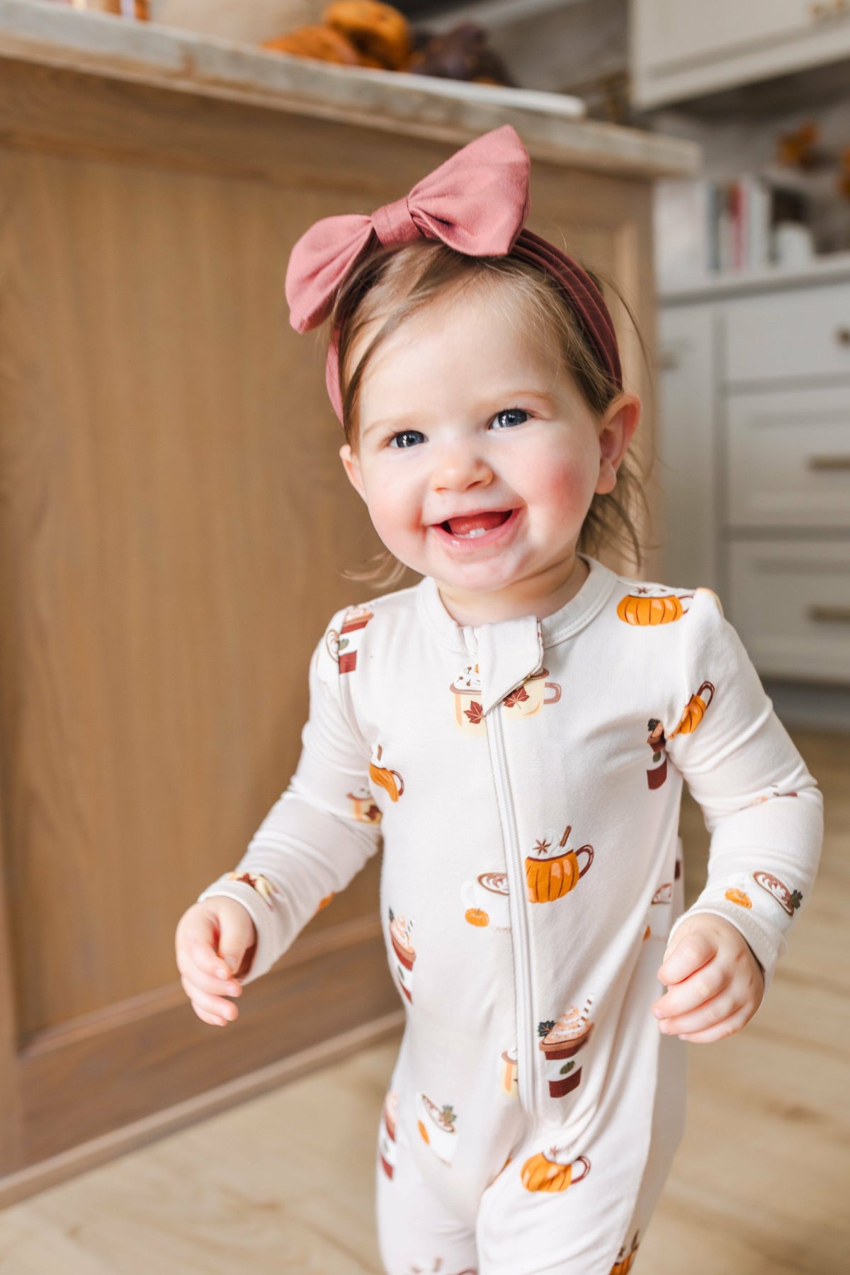 Kyte Baby Zippered Romper in Pumpkin Spice Latte