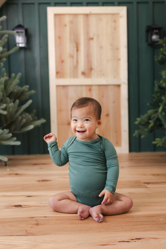 Kyte Baby Long Sleeve Bodysuit in Pine