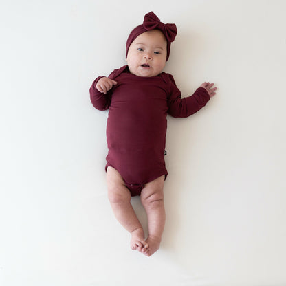 Kyte Baby Long Sleeve Bodysuit in Burgundy