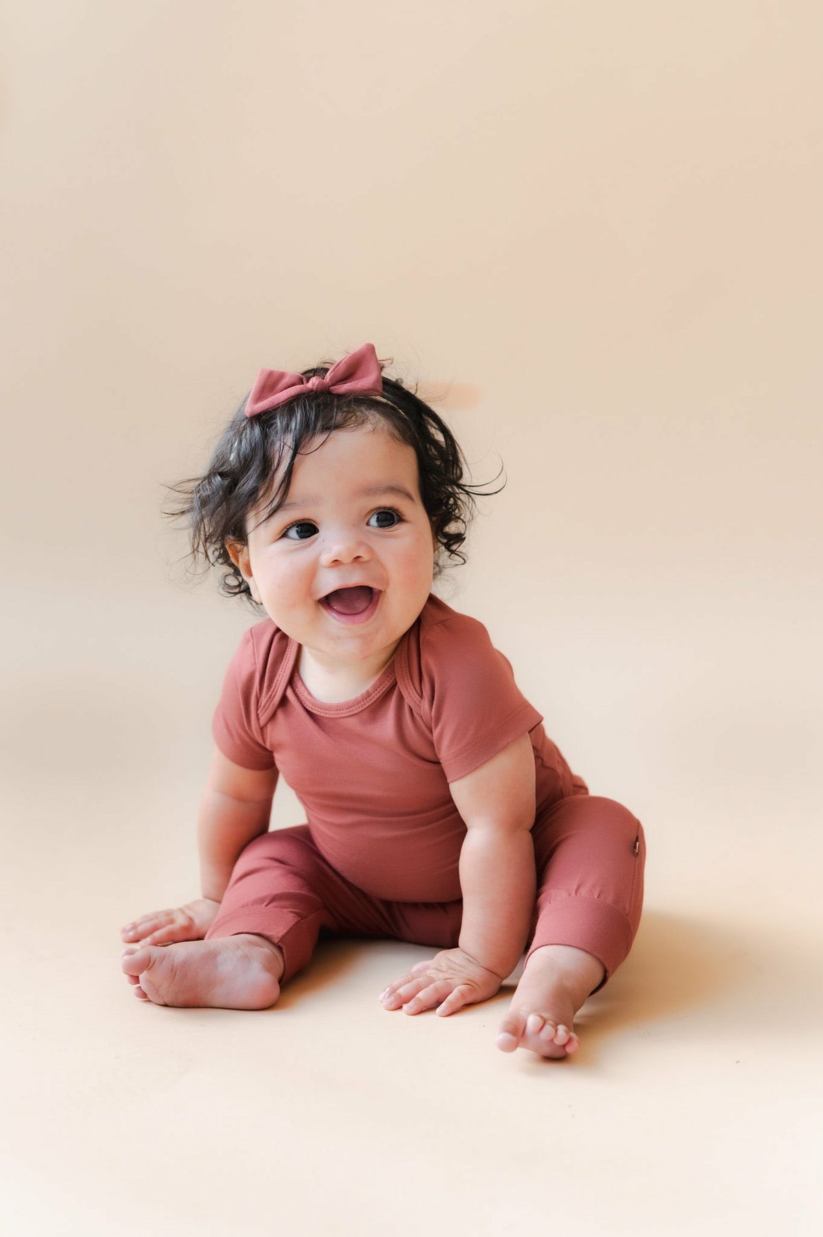 Kyte Baby Bodysuit in Ember