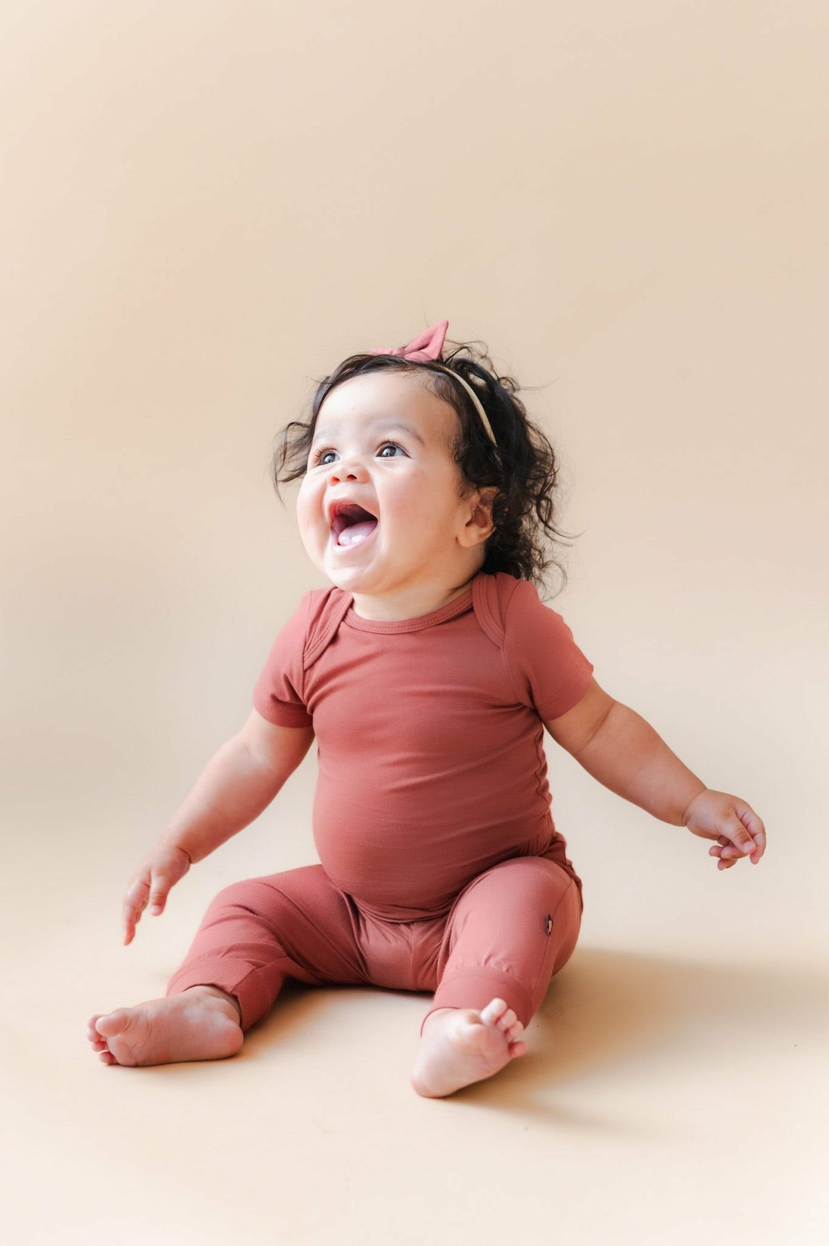 Kyte Baby Bodysuit in Ember