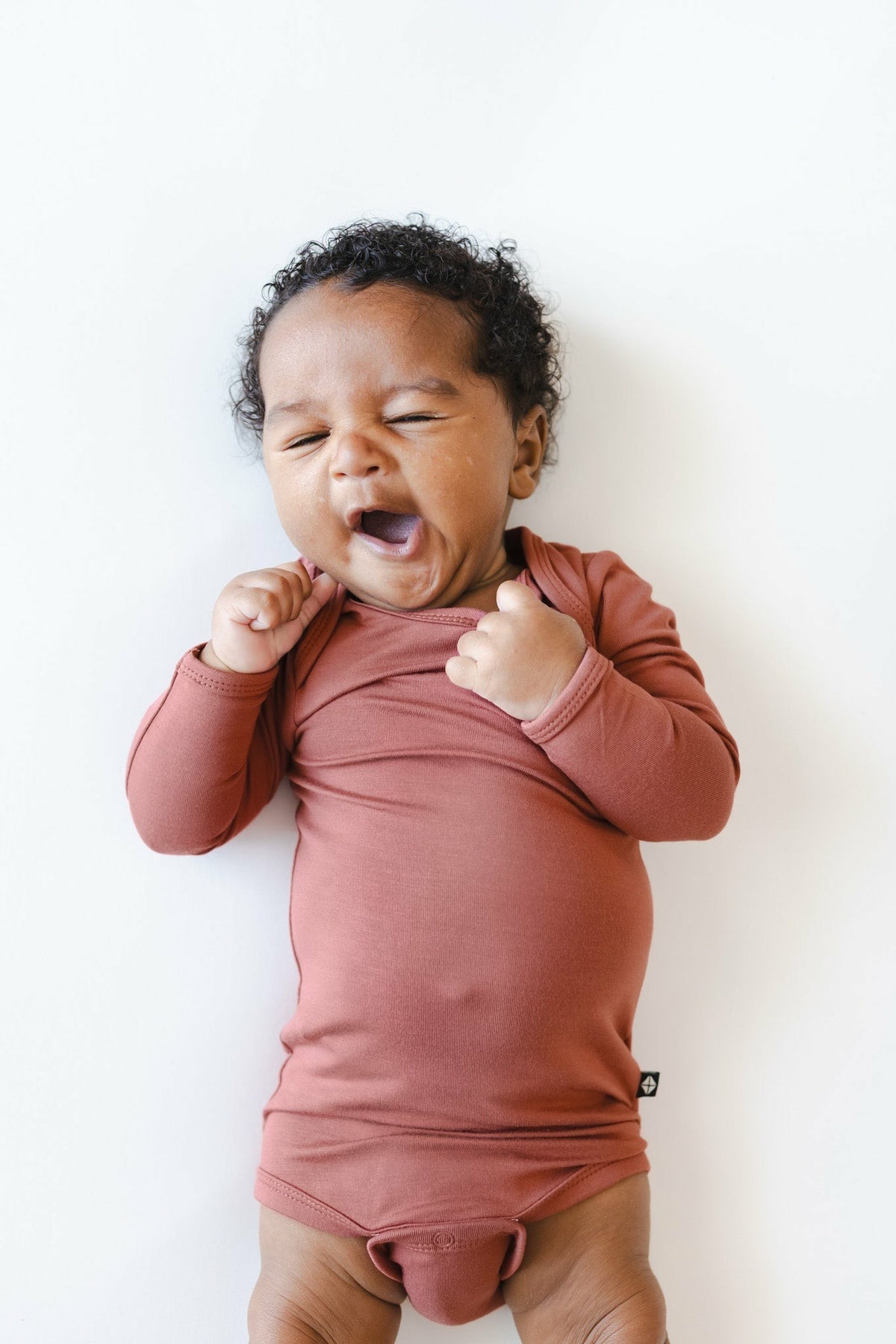 Kyte Baby Long Sleeve Bodysuit in Ember