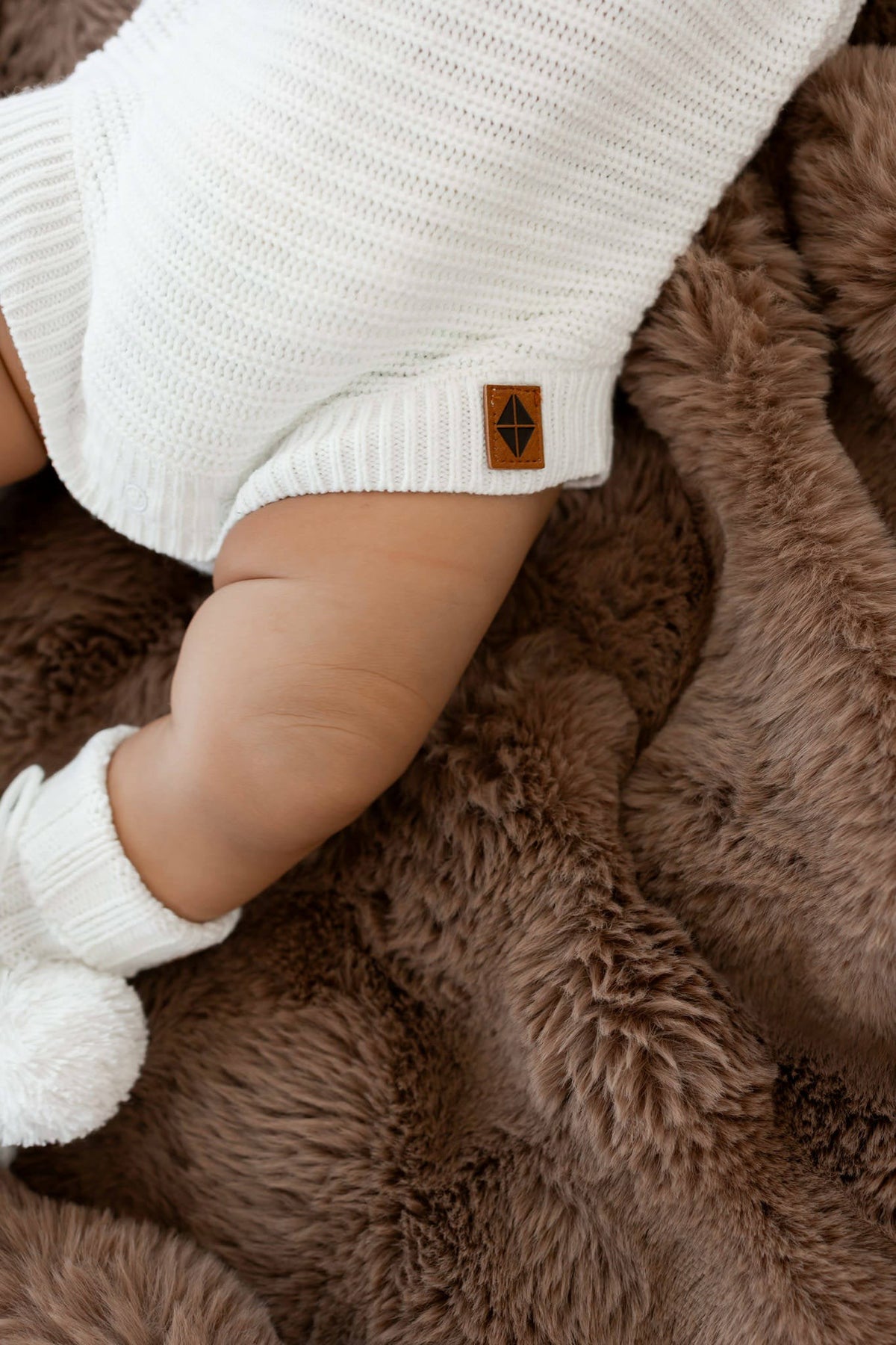 Kyte Baby Chunky Knit Romper in Cloud